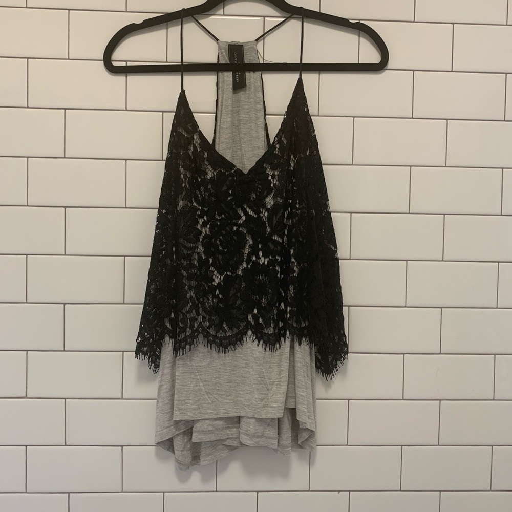 Akira tank top with lace detail. Only worn once.